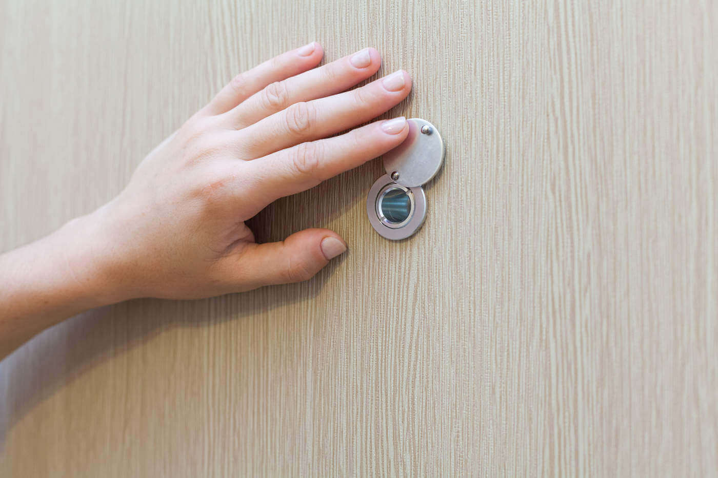 19.Install a Peephole or Door Viewer